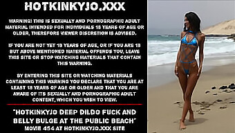 Public Beach Encounter With A Deep Dildo Penetration And Visible Belly Bulge