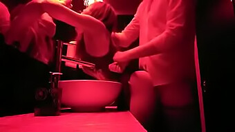 Gay Men Engaging In Anal Sex In A Public Restroom At A Nightclub