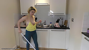 Delilah Cleans The Kitchen And Showcases Her Sexy Brown Downblouse