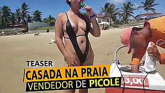 Una Esposa Rubia En Tanga En La Playa, Intercambiando Su Seno Por La Punta De Un Vendedor De Helados